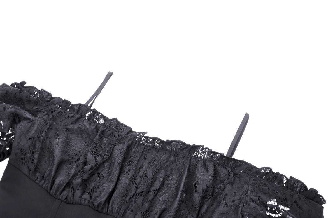Close-up of black lace off-shoulder neckline of a gothic dress with ruffled detailing and straps.