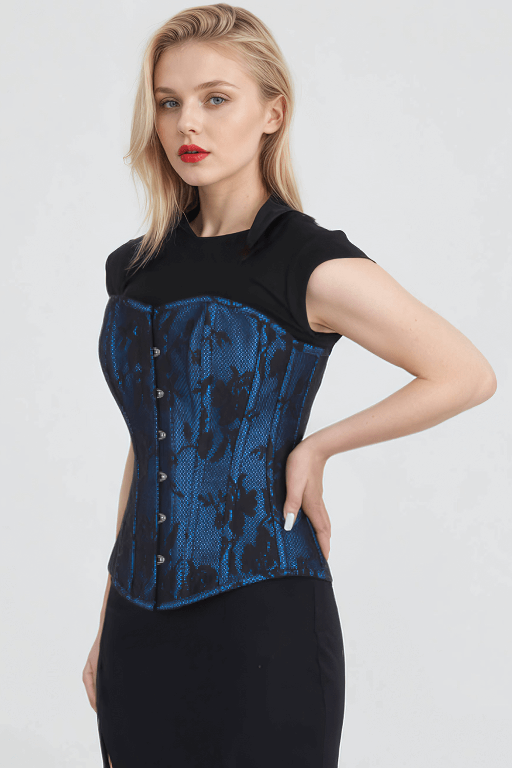 Lace overbust corset with steel boning in blue, model showcasing hourglass figure and elegant design.