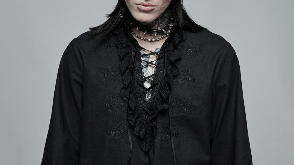 Black lace-trimmed Gothic shirt with skeleton embroidery, worn by model showcasing dark elegance and adjustable drawstring neck.