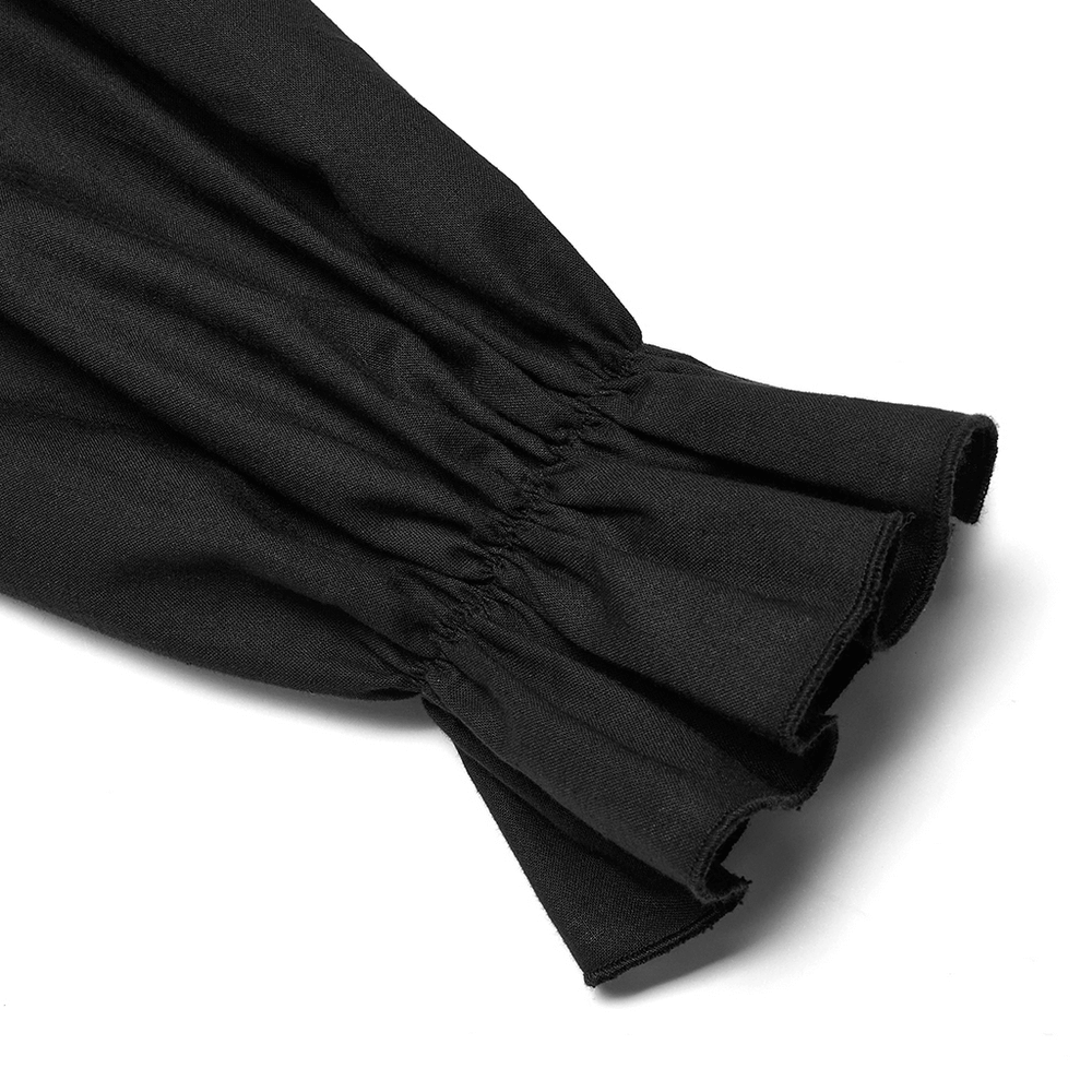 Close-up of the gathered sleeve of a black Gothic shirt showcasing elegant fabric texture.