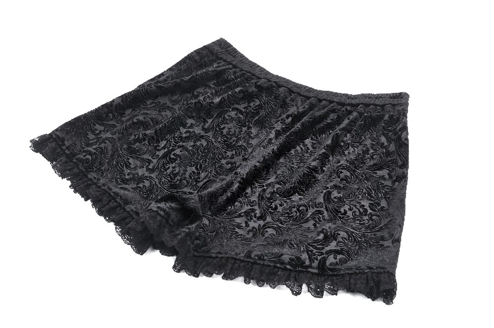 Elegant lace-trimmed velvet high-waisted shorts with a stylish button detail, perfect for chic outings.