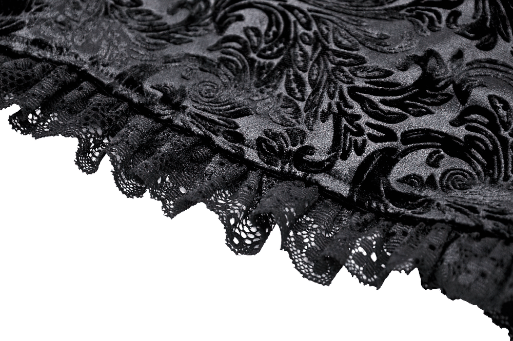 Close-up of elegant lace trim on luxurious velvet fabric, perfect for high-waisted shorts.