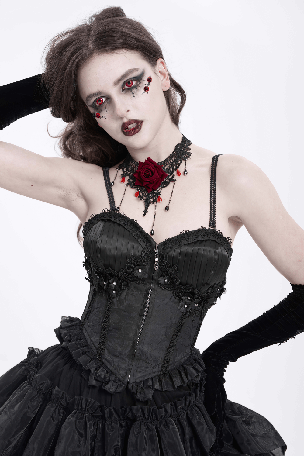 Elegant black floral corset with ruffle detail, lace-up design, perfect for gothic fashion enthusiasts.