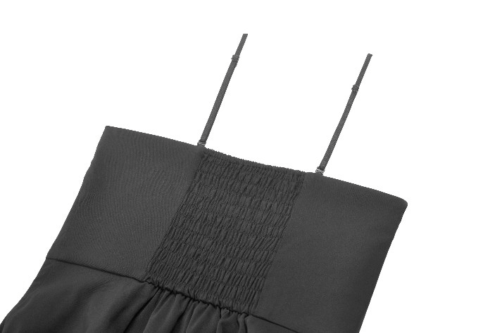 Close-up of black dress bodice featuring lace details and adjustable straps, perfect for punk rock style.