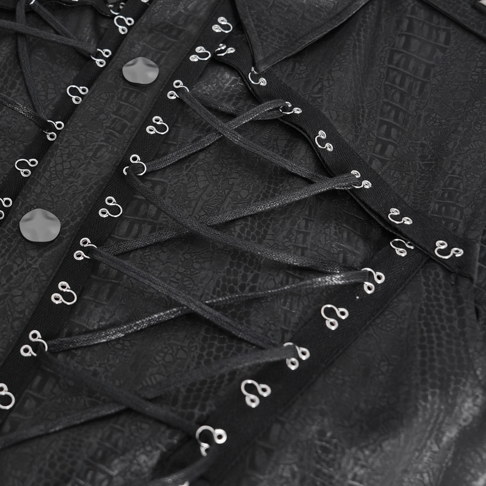 Close-up of a black lace-up sleeveless shirt featuring epaulets and metal buttons, perfect for edgy fashion.