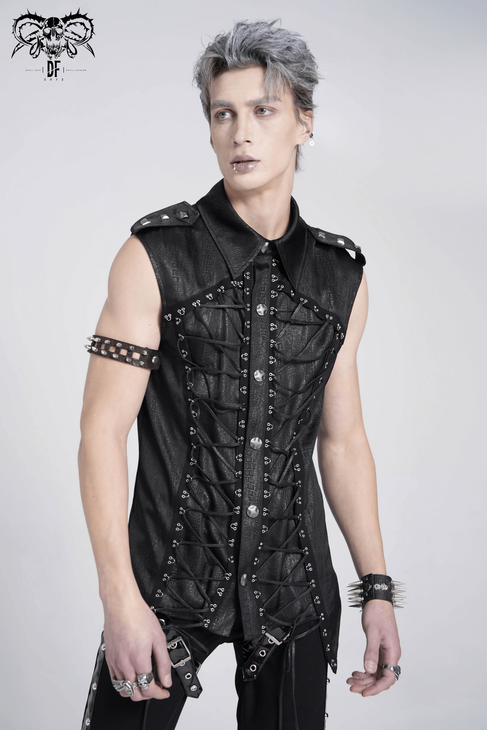 Stylish lace-up sleeveless shirt with epaulets and metal buttons for edgy fashion lovers.