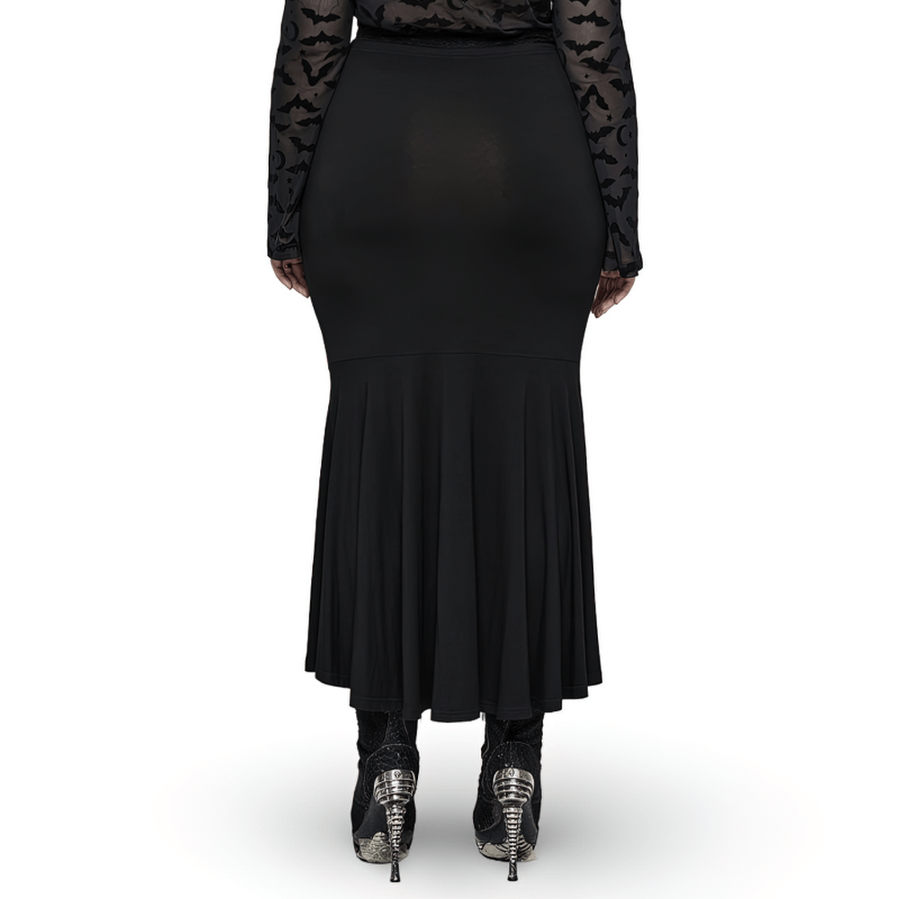 Back view of a chic black fishtail skirt, showcasing elegant pleats for a sophisticated silhouette.