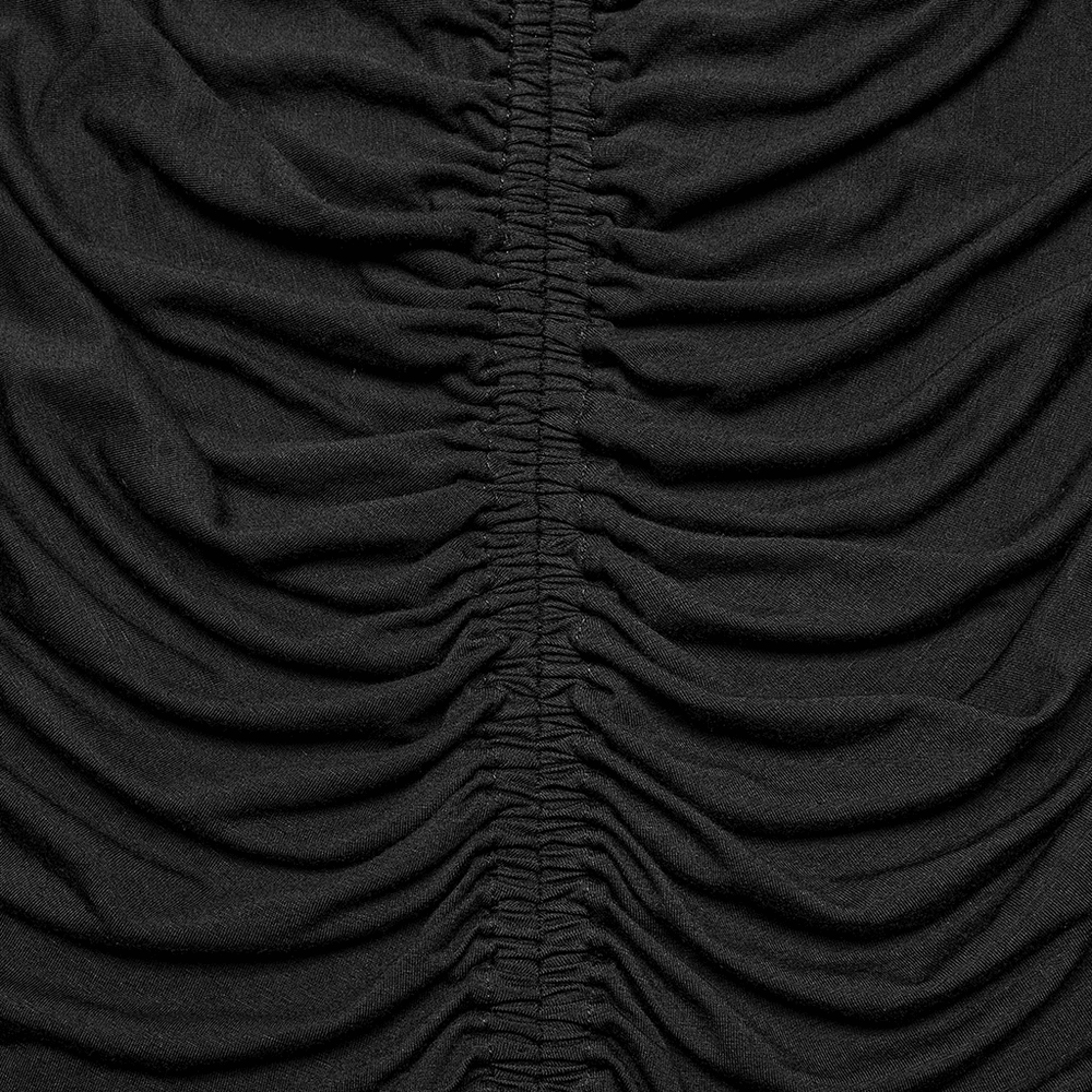 Close-up of ruched black fabric, showcasing elegant texture for chic fashion designs.