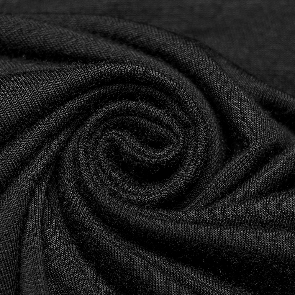 Close-up of soft black modal fabric showcasing its smooth texture and elasticity, perfect for elegant skirt designs.