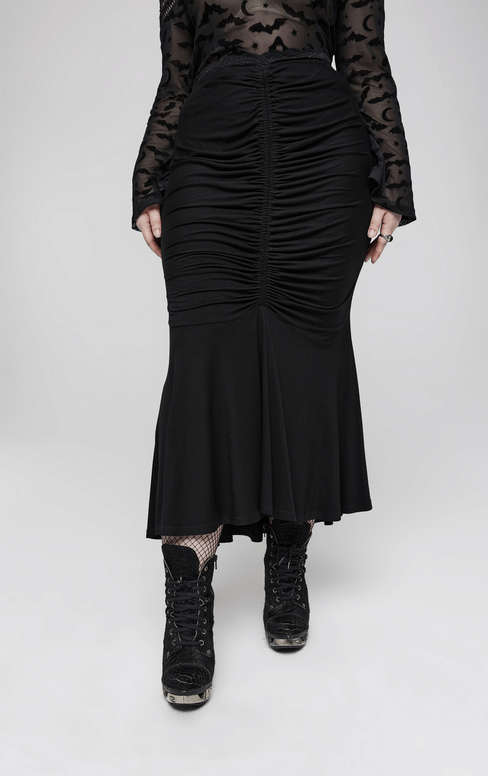 Chic black lace-waist modal fishtail skirt with ruched design, perfect for a goth-inspired elegant outfit.