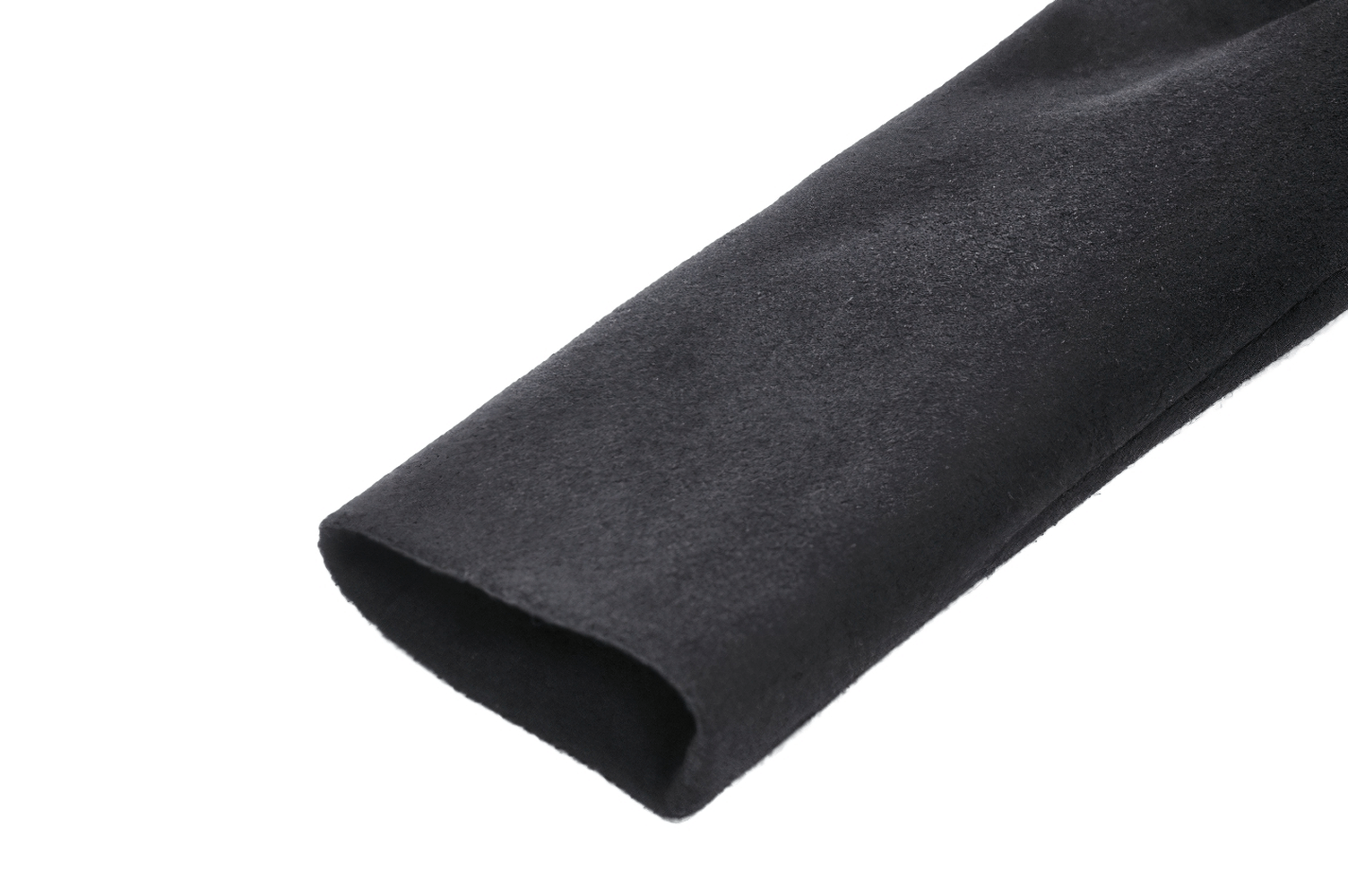 Close-up of a black fabric sleeve showcasing soft texture, ideal for elegant outerwear like Victorian style coats.