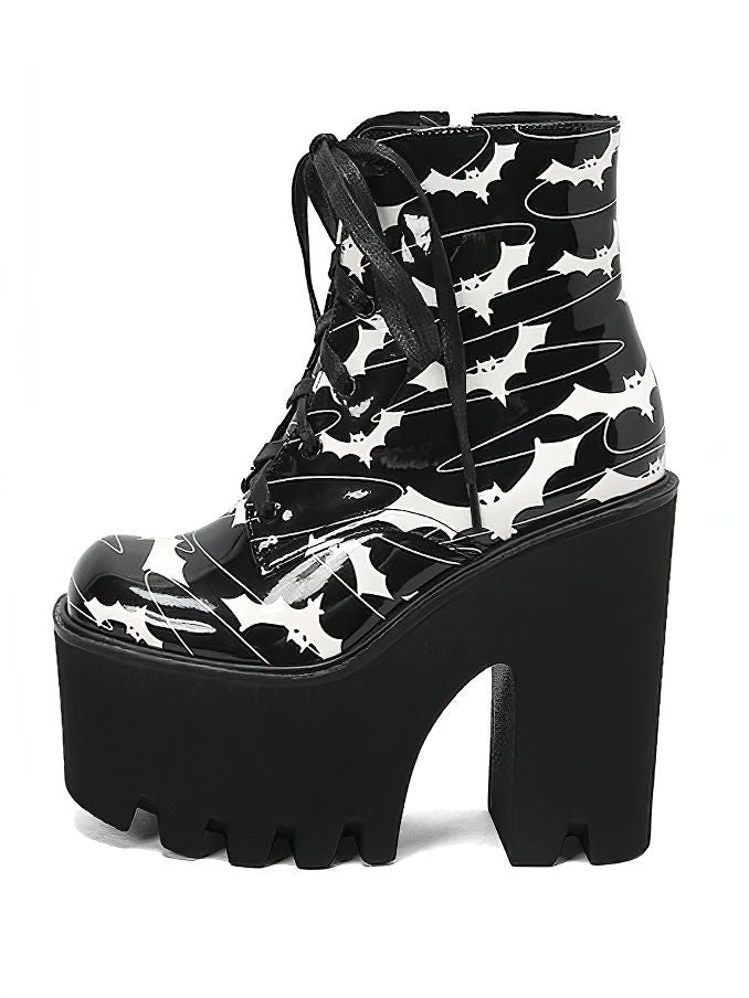 Ladies goth platform ankle boots with bat print and thick high heels, perfect for bold fashion statements.