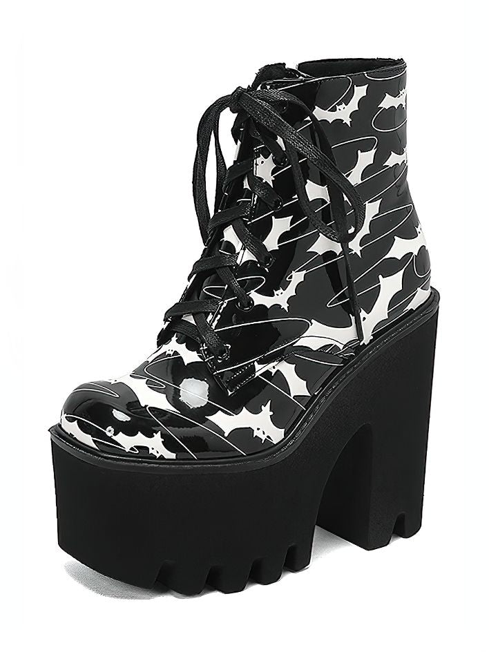 Ladies goth platform ankle boots with bat print, featuring thick high heels for a stylish and edgy look.