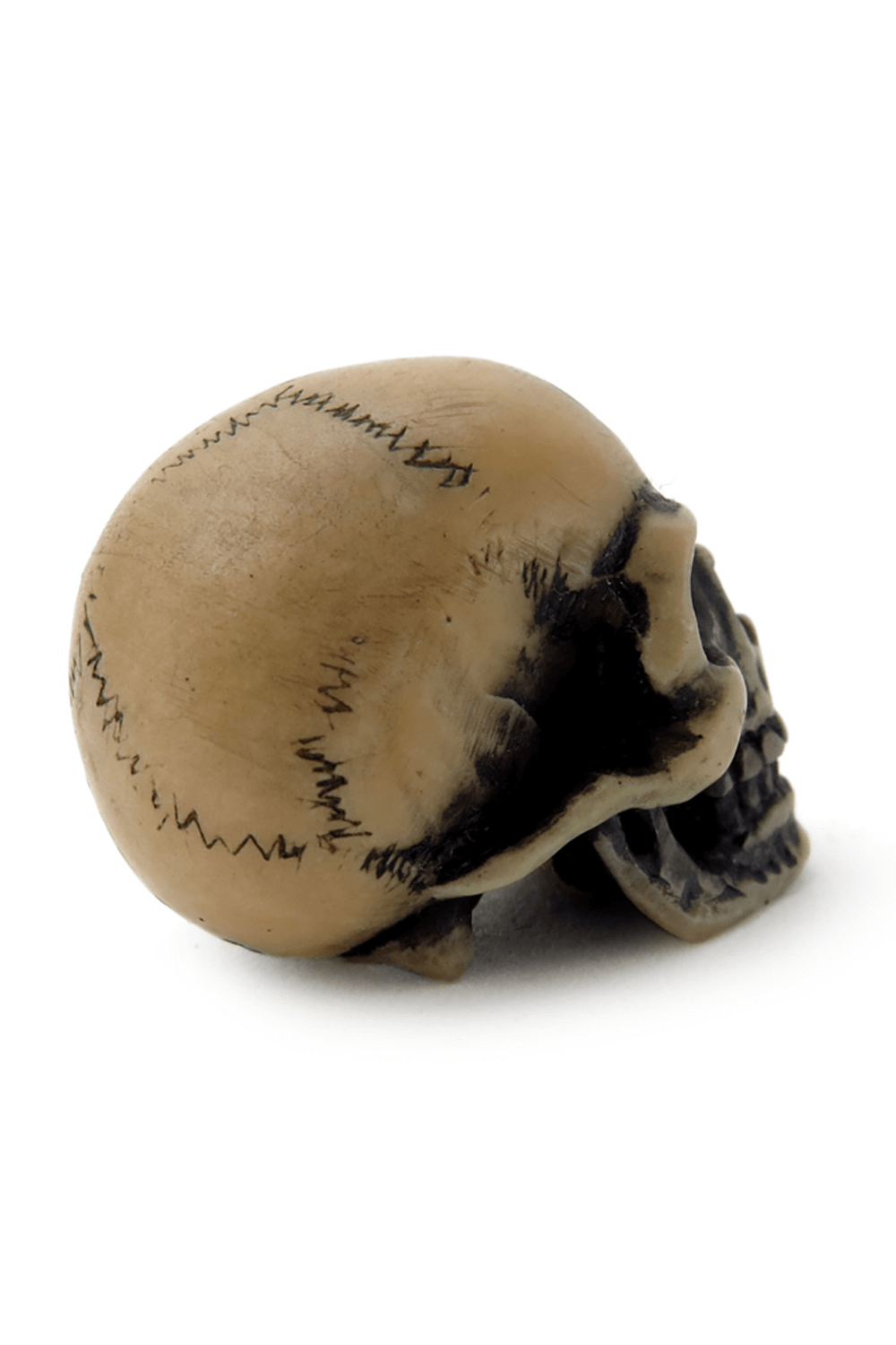 Tiny Lapillus skull worry stone with mystical symbols for gothic decor and worry relief.