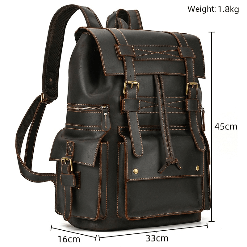 Large unisex genuine leather laptop travel backpack with multiple pockets and stylish design.