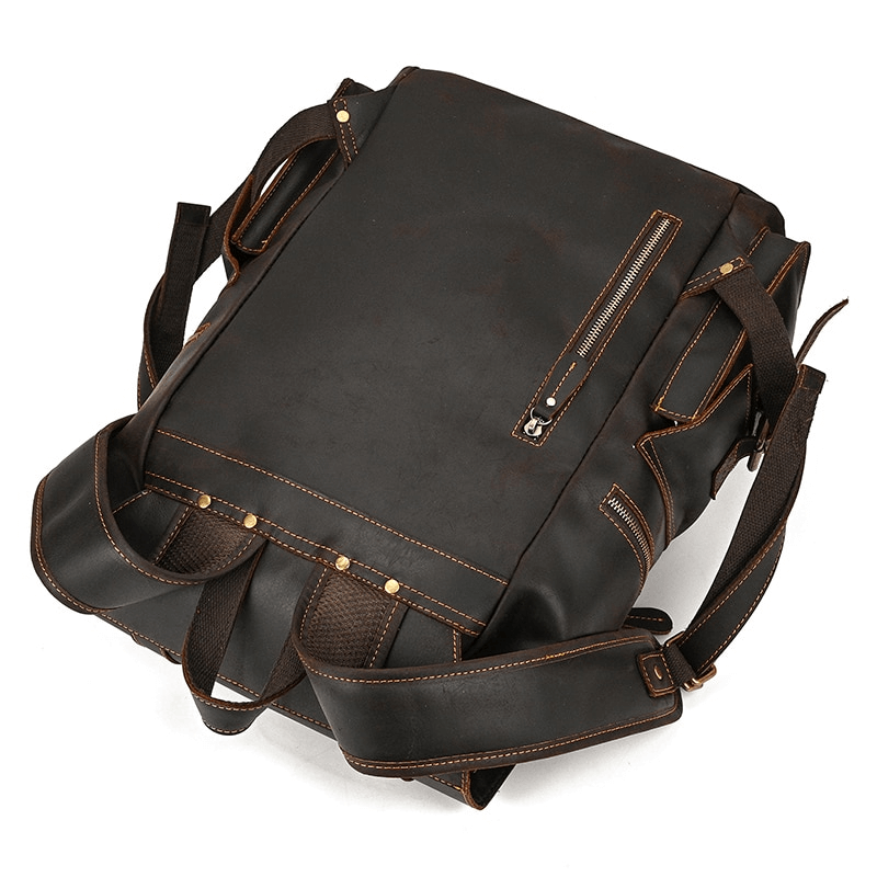 Large genuine leather laptop travel backpack with multiple pockets and adjustable straps.