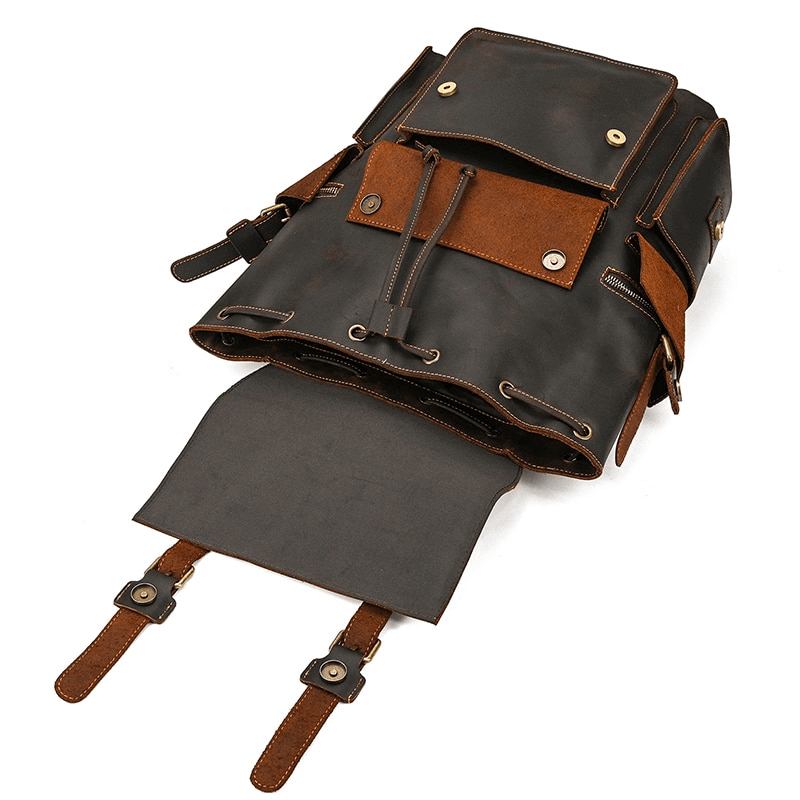 Large genuine leather laptop travel backpack with multiple pockets for organization in casual unisex style.