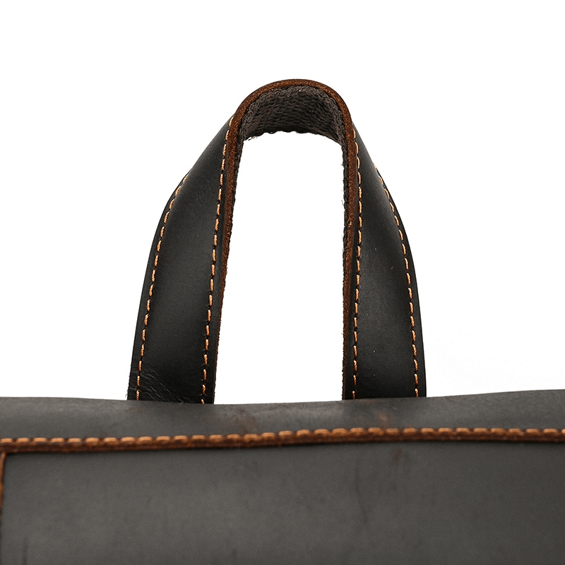 Stylish leather backpack handle showcasing quality stitching for a fashion-forward unisex travel accessory.