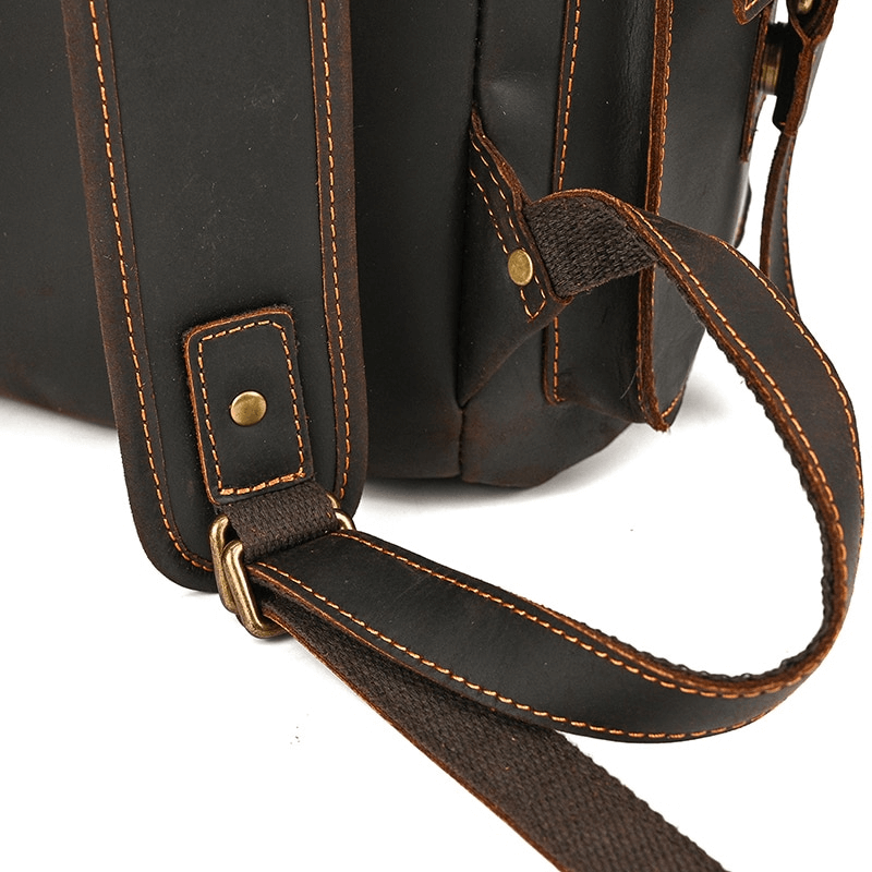 Close-up of stylish genuine leather backpack strap, showcasing craftsmanship and durable design for everyday use.