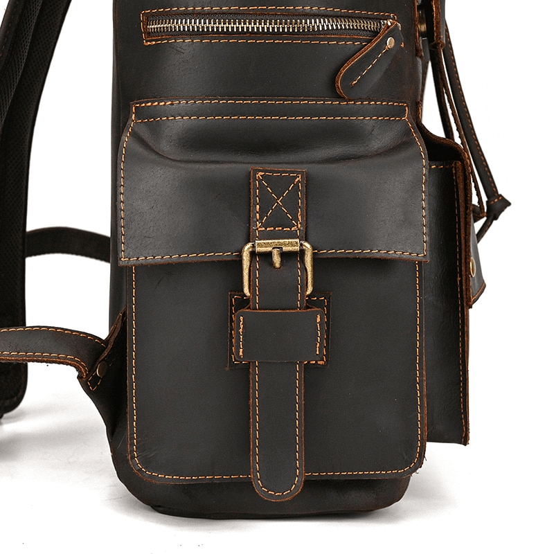 Stylish leather backpack featuring multiple pockets and adjustable straps for travel and daily use.