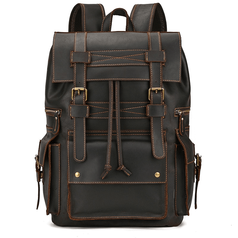 Stylish large genuine leather travel backpack with many pockets for organized storage.