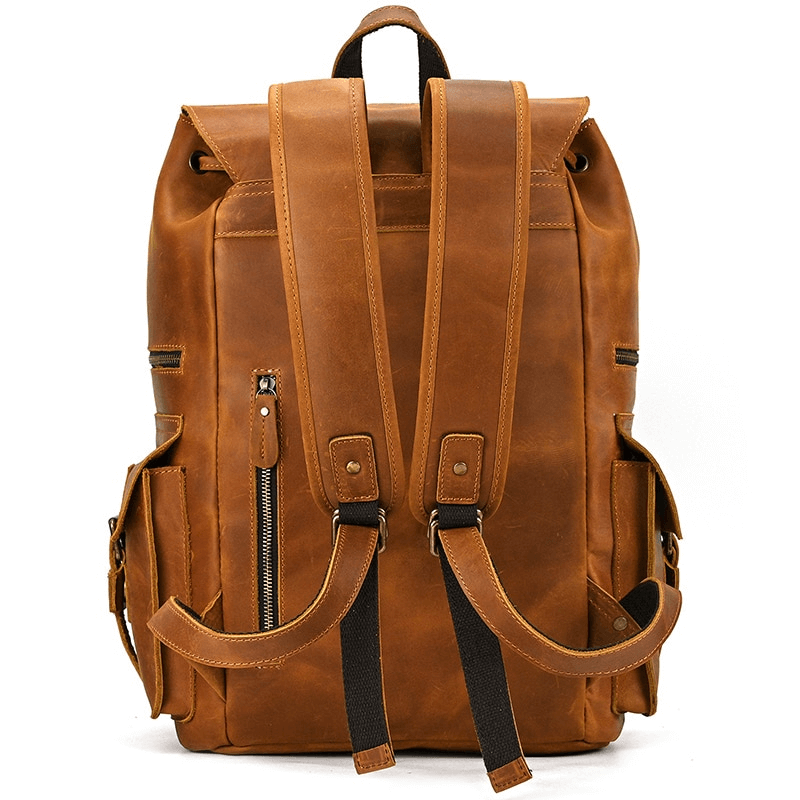 Large genuine leather laptop travel backpack with multiple pockets, perfect for casual style and everyday organization.