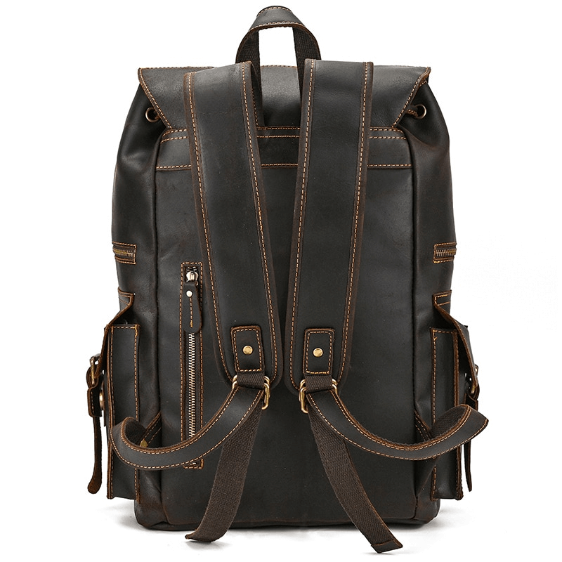Large genuine leather unisex laptop travel backpack with multiple pockets and stylish design.