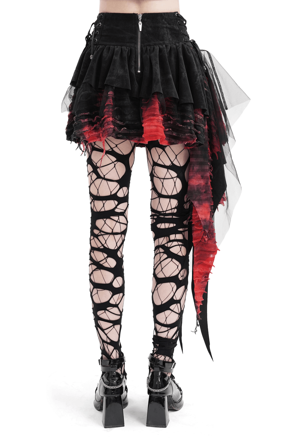 Edgy layered asymmetrical gothic skirt in red and black with lace and tulle, paired with striking black fishnet tights.