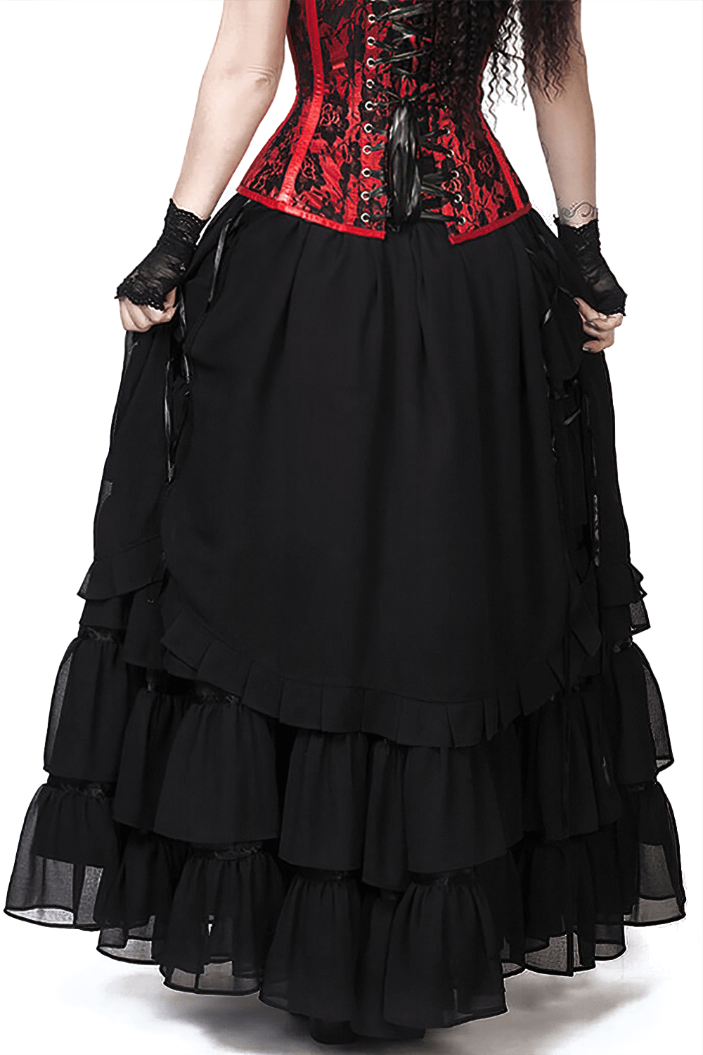 Back view of a layered black Victorian maxi skirt paired with a red corset, perfect for elegant evenings.