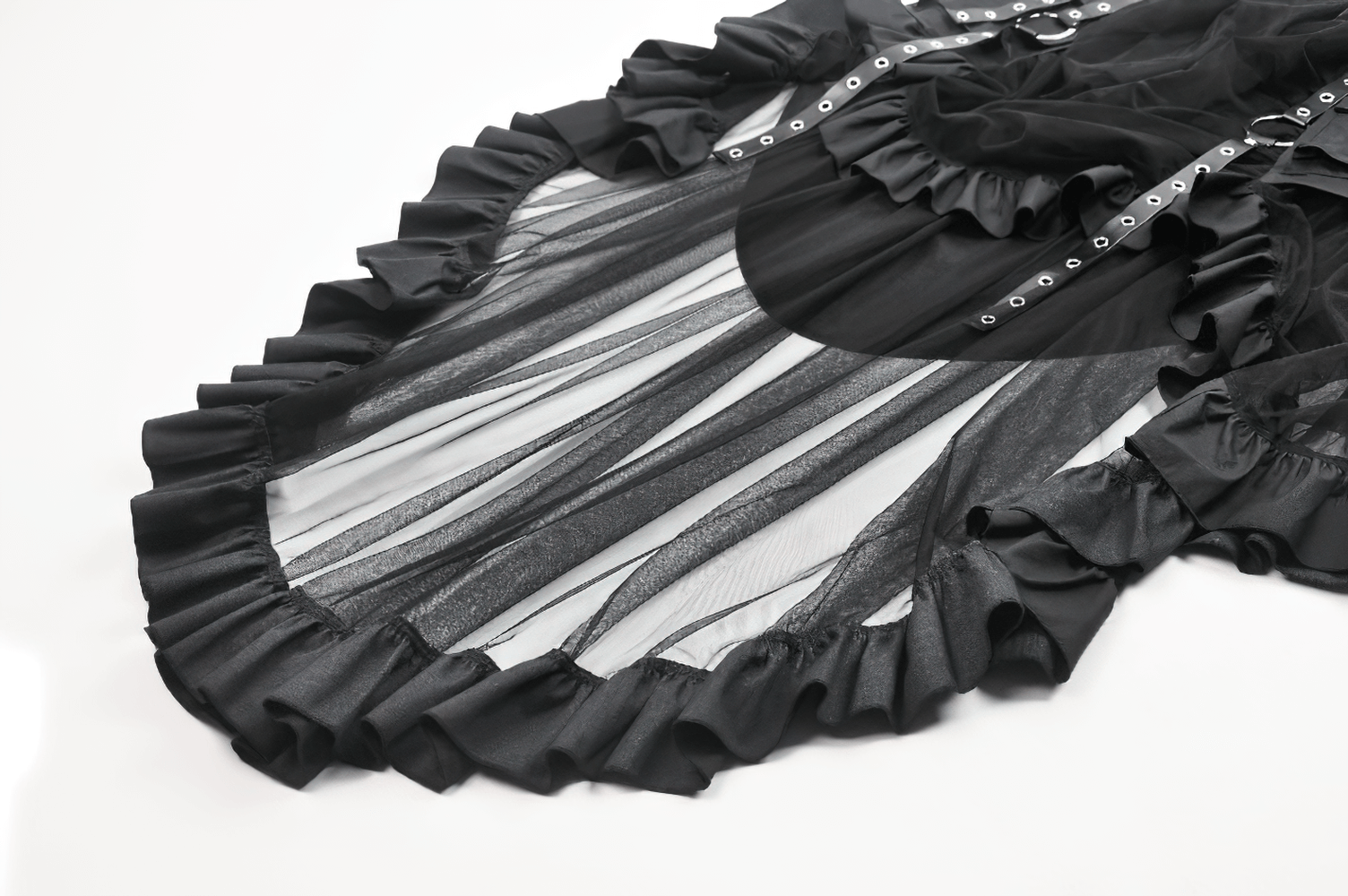 Layered black mesh high-low ruffle skirt with buckles and asymmetric design, perfect for punk and gothic fashion.