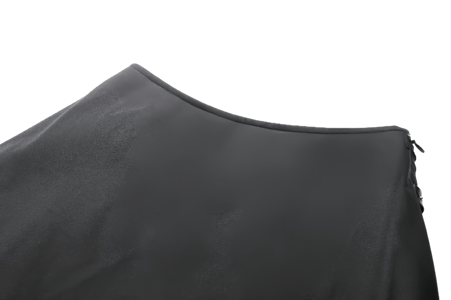 Close-up of black high-low ruffle skirt showcasing smooth fabric and zipper detail for women.