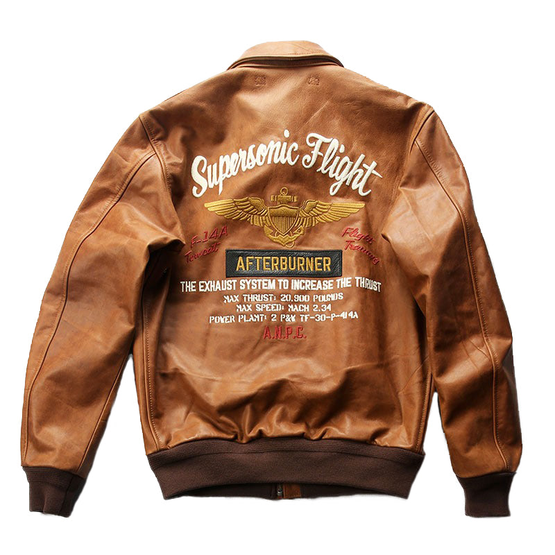 Men's bomber jacket with 'Supersonic Flight' embroidery, brown leather with patches, stylish and unique design.