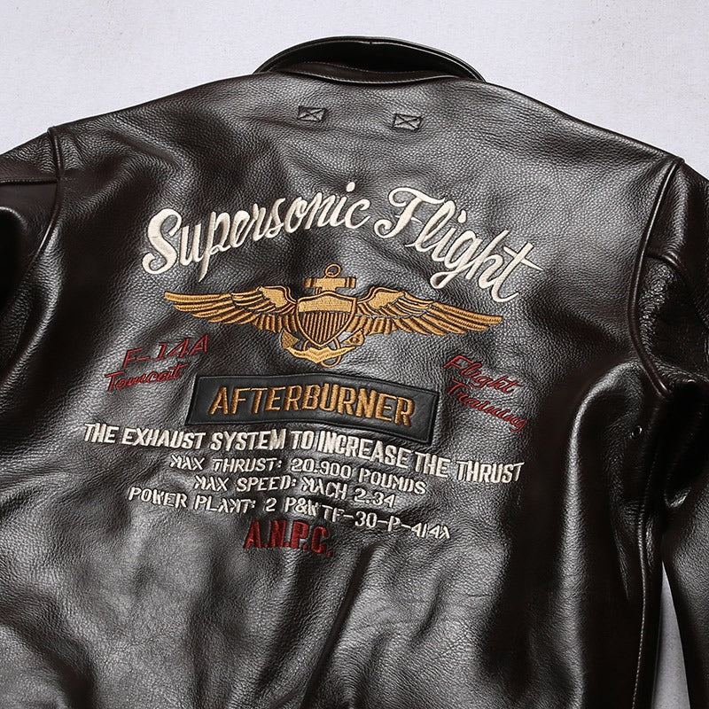 Men's leather biker jacket back design featuring 'Supersonic Flight' embroidery and patches.