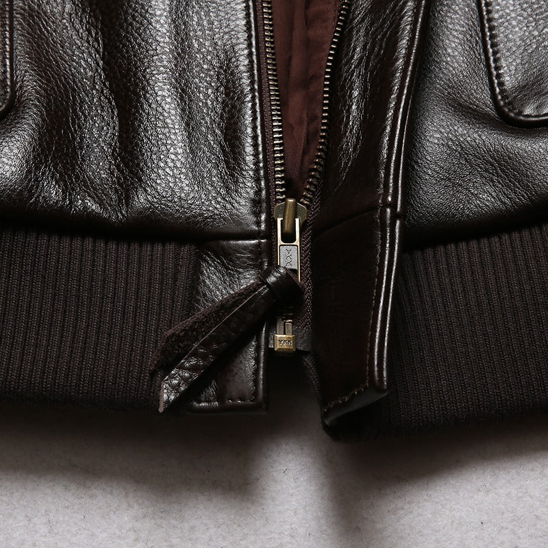 Close-up of high-quality leather biker jacket zipper detail, showcasing stylish design and durable craftsmanship.