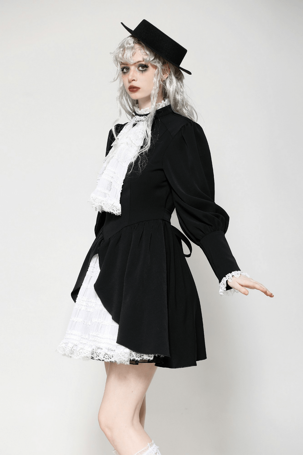 Elegant Gothic Lolita dress featuring black and white lace trim, ruffled skirt, and a stylish hat. Perfect for cosplay!