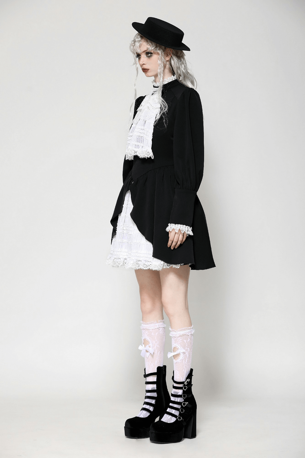 Elegant gothic Lolita dress with lace trim, featuring a ruffled skirt, long sleeves, and a chic hat. Perfect for themed events!