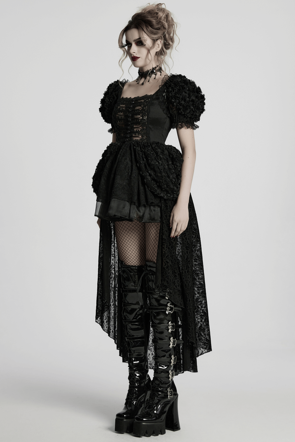 Gothic black lace dress with puff sleeves, corset detail, and dramatic skirt, perfect for elegant gothic looks.