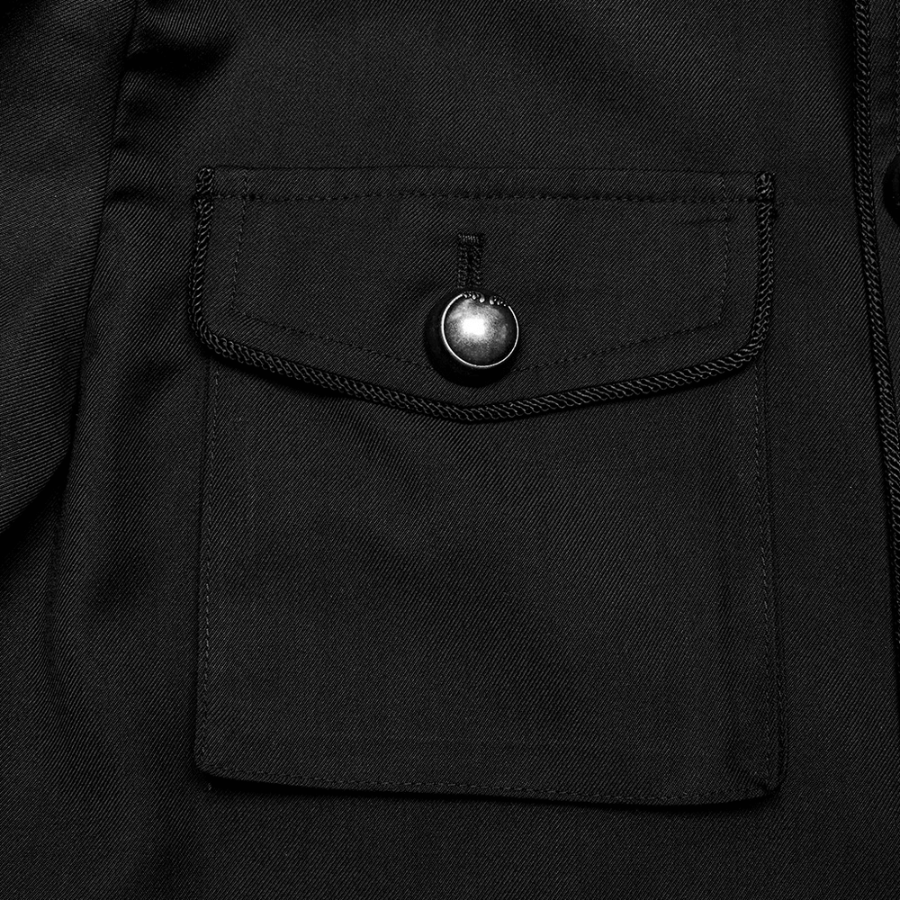 Close-up of the pocket on a long black military-style trench coat for men, showcasing its sturdy woven fabric.