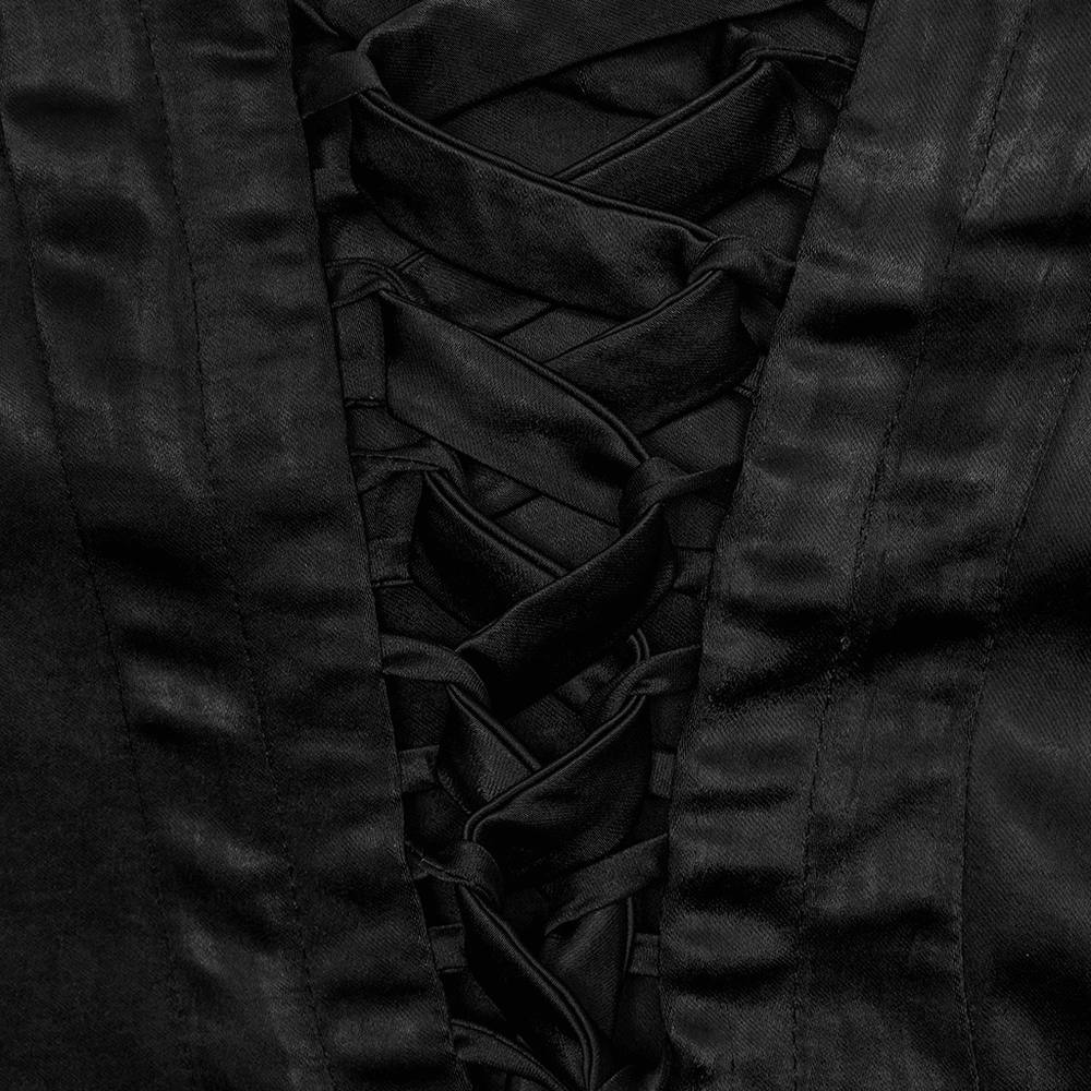 Close-up view of black lace-up back detailing on an elegant gothic dress.