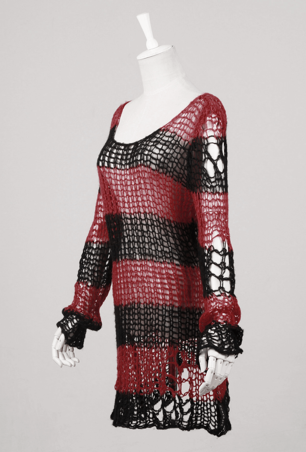 Long sleeves red and black striped crocheted sweater showcasing bold, edgy style on a mannequin.