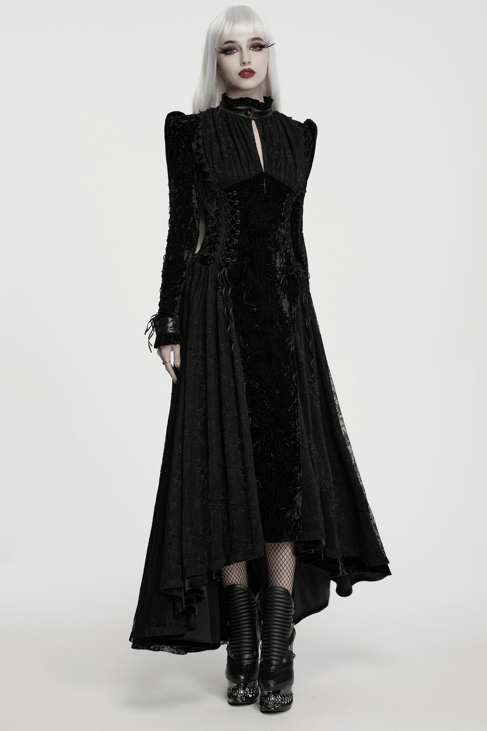 Long Velvet Dress with Lace Trim and Fitted Waistline in black with corset lacing, keyhole neck, and flowing layered skirt