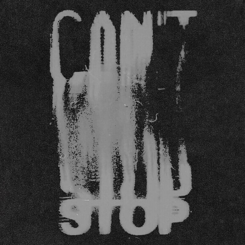 Gothic graphic print featuring distressed text that says 'CAN'T STOP' on a black background.