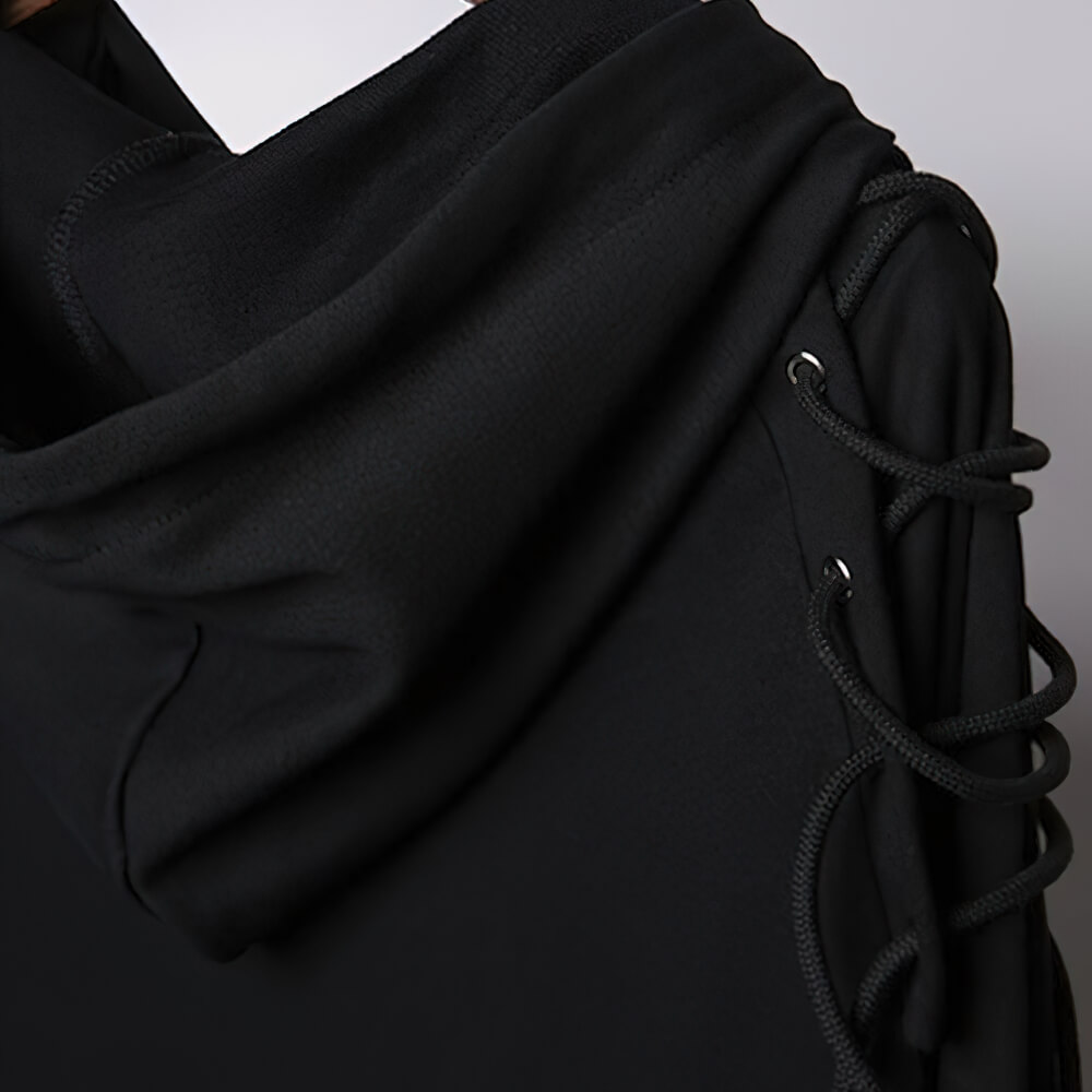Close-up of black hooded sweatshirt showcasing unique lace detail on shoulders for stylish unisex fashion.