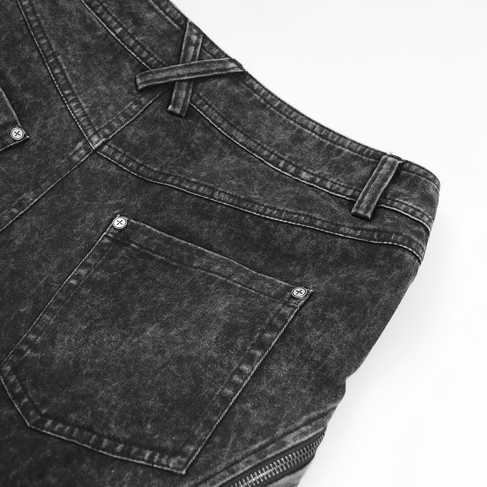 Loose distressed black jeans showing wide-leg design and trendy pockets for casual urban styling.