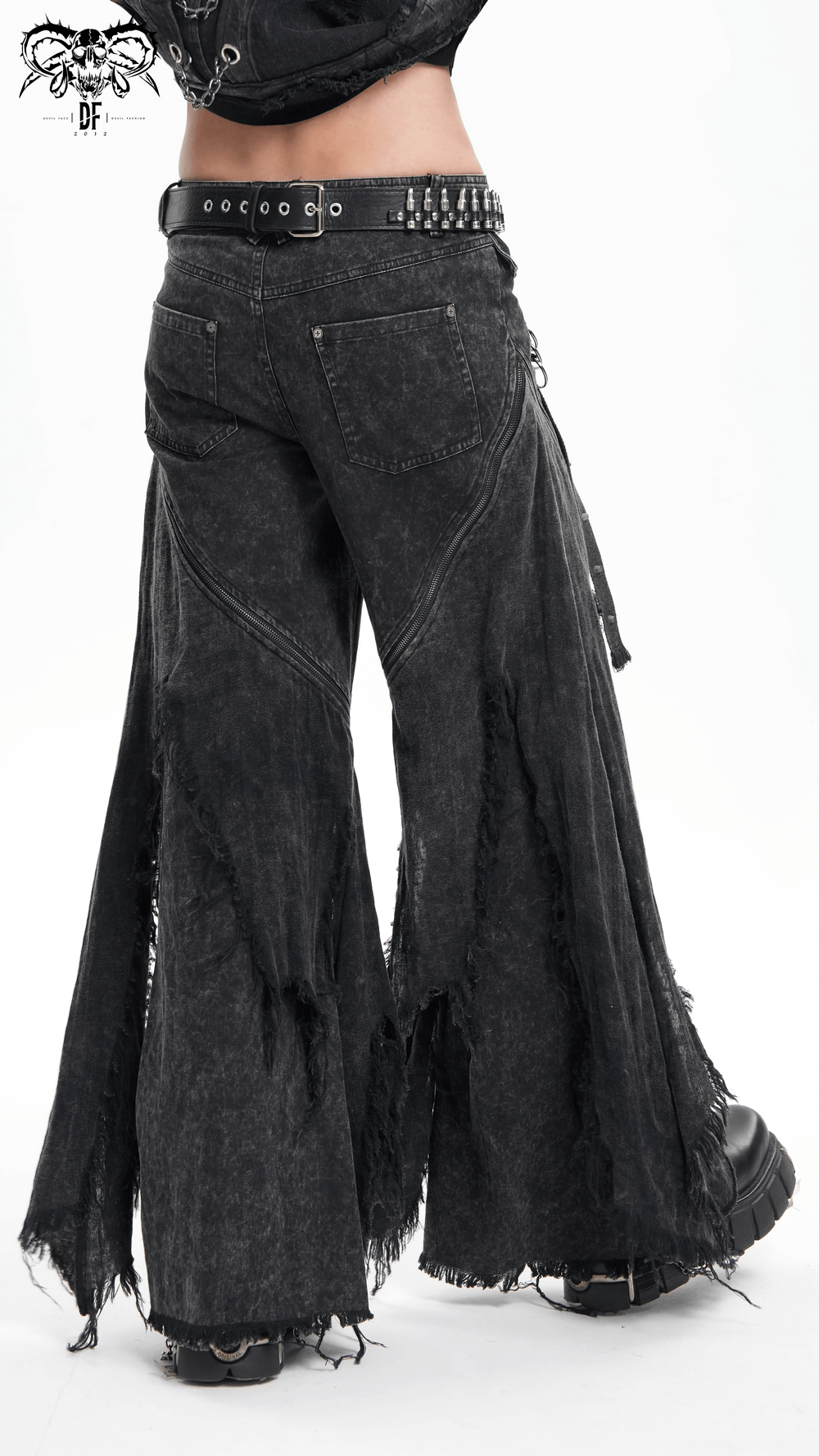 Wide-leg distressed black jeans with frayed edges, perfect for urban streetwear styles and casual outings.