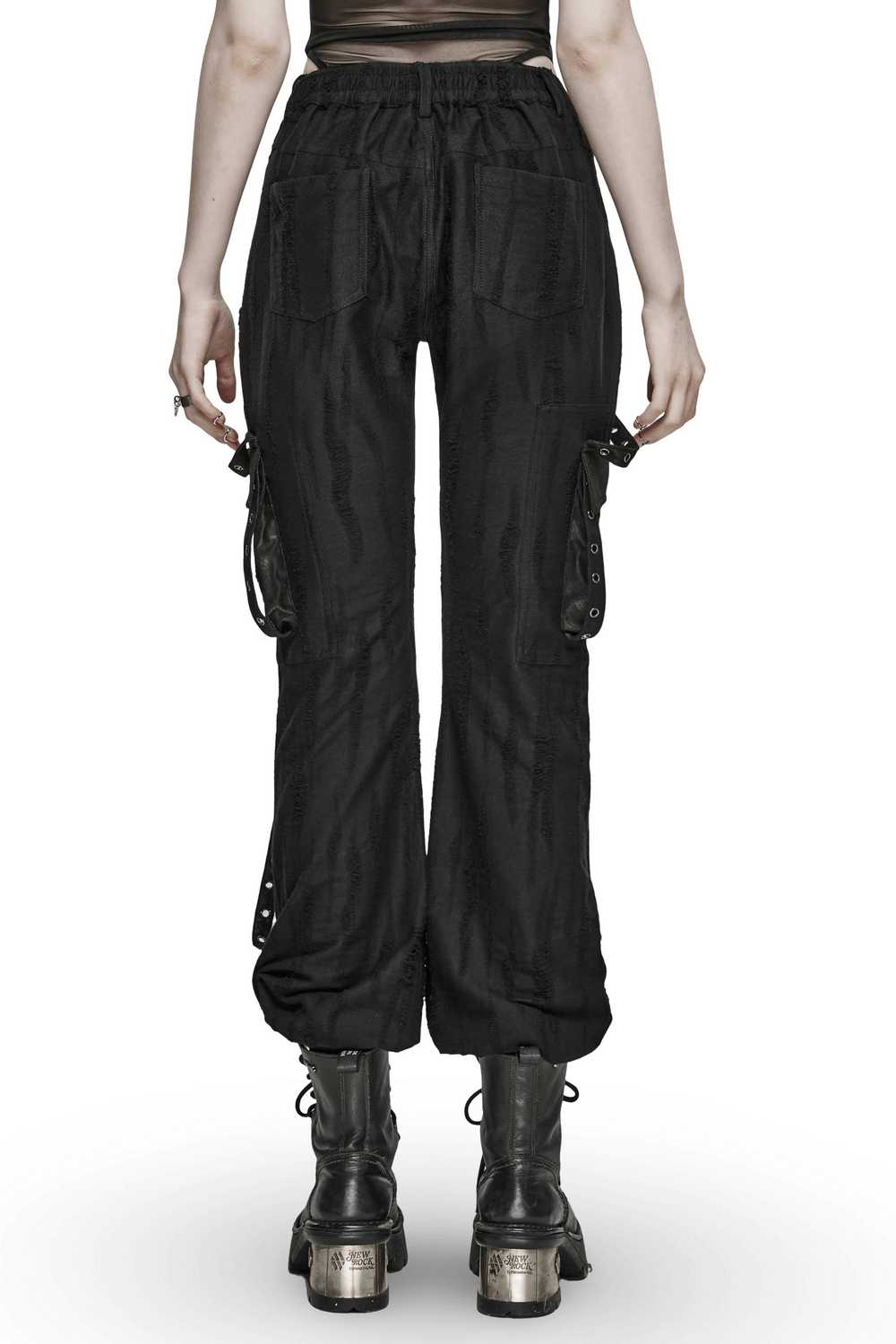 Back view of loose-fit black gothic cargo pants with O-rings and textured fabric, perfect for edgy streetwear fashion.