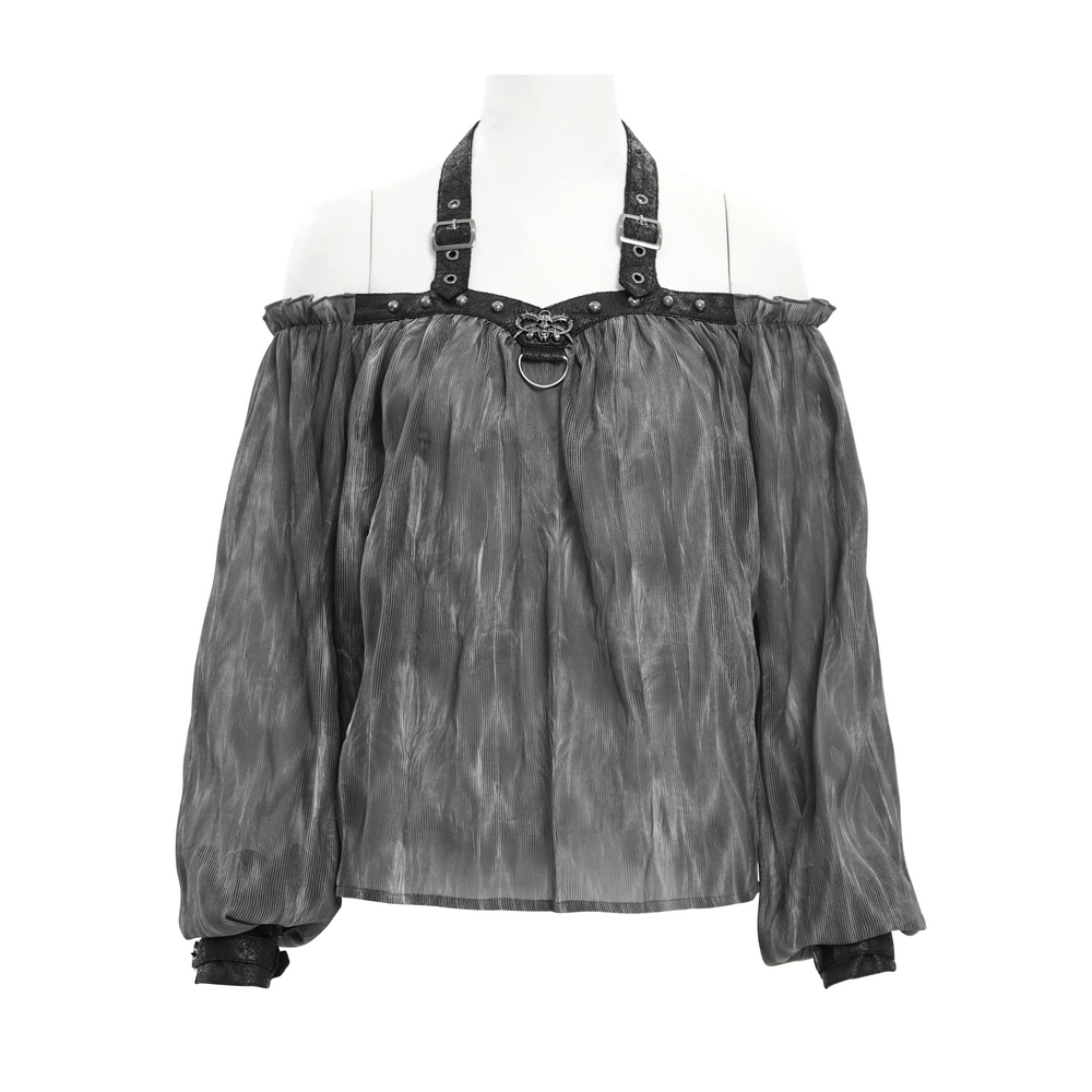 Dark off-shoulder top with halter straps, metal accents, and flowing sleeves for a gothic-chic style.