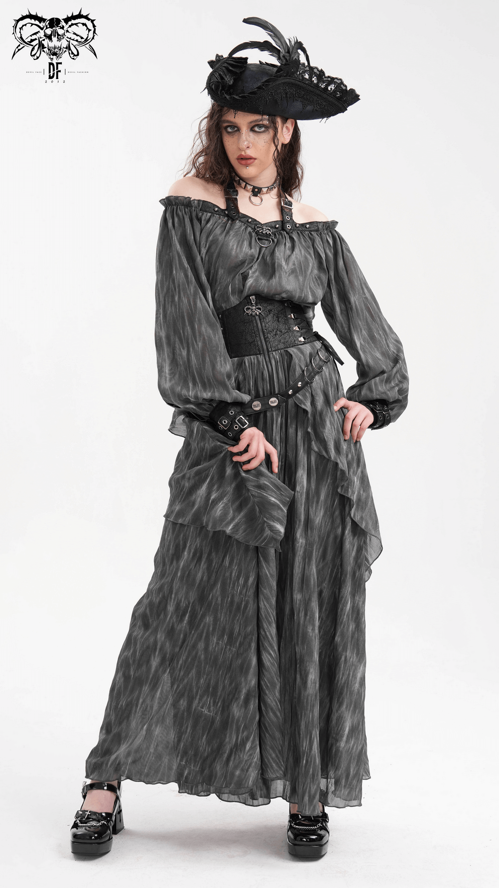 Dark off-shoulder top with flowing sleeves, gothic charm, and a dramatic hat for edgy elegance. Perfect for alternative fashion.