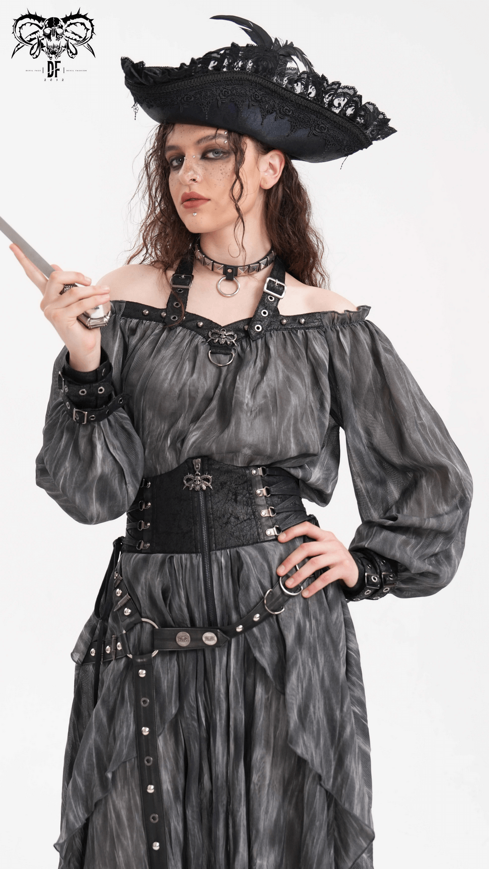 Dark off-shoulder gothic top with halter straps, metal accents, and a pirate hat, exuding edgy elegance.