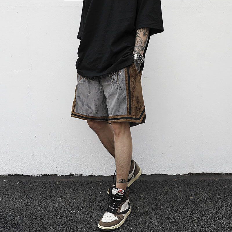 Men's loose shorts with drawstring, featuring stylish embroidery and a casual fit, perfect for summer outings.